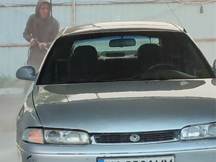 Серый Мазда 626, объемом двигателя 2 л и пробегом 347 тыс. км за 1100 $, фото 1 на Automoto.ua