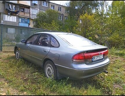 Серый Мазда 626, объемом двигателя 1.8 л и пробегом 600 тыс. км за 2000 $, фото 1 на Automoto.ua