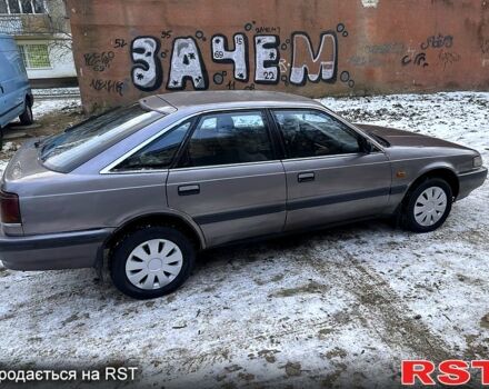 Серый Мазда 626, объемом двигателя 2 л и пробегом 200 тыс. км за 1150 $, фото 1 на Automoto.ua