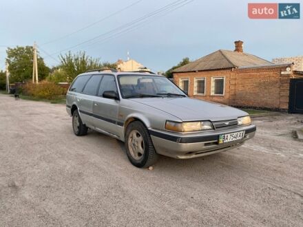 Серый Мазда 626, объемом двигателя 2 л и пробегом 235 тыс. км за 999 $, фото 1 на Automoto.ua