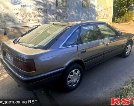 Сірий Мазда 626, об'ємом двигуна 2 л та пробігом 200 тис. км за 1000 $, фото 1 на Automoto.ua