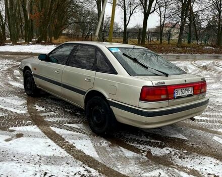 Серый Мазда 626, объемом двигателя 2.2 л и пробегом 300 тыс. км за 2200 $, фото 1 на Automoto.ua