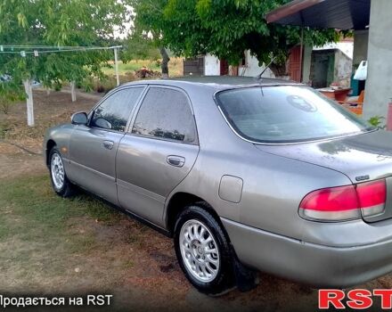 Сірий Мазда 626, об'ємом двигуна 1.8 л та пробігом 325 тис. км за 1500 $, фото 1 на Automoto.ua