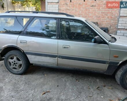 Сірий Мазда 626, об'ємом двигуна 2 л та пробігом 235 тис. км за 700 $, фото 1 на Automoto.ua