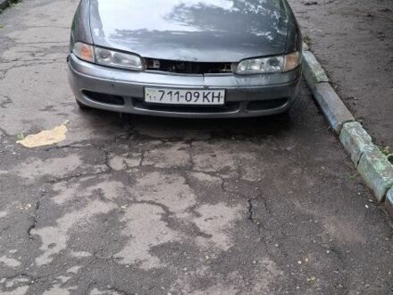 Серый Мазда 626, объемом двигателя 2.5 л и пробегом 300 тыс. км за 477 $, фото 1 на Automoto.ua