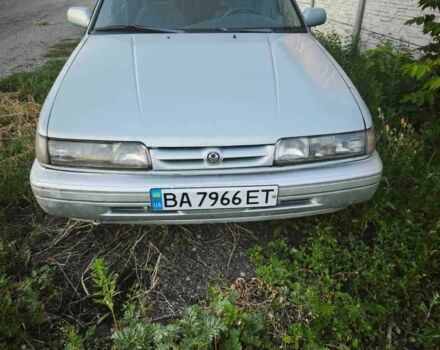 Сірий Мазда 626, об'ємом двигуна 2 л та пробігом 200 тис. км за 1003 $, фото 1 на Automoto.ua