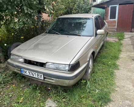 Серый Мазда 626, объемом двигателя 2 л и пробегом 500 тыс. км за 290 $, фото 1 на Automoto.ua