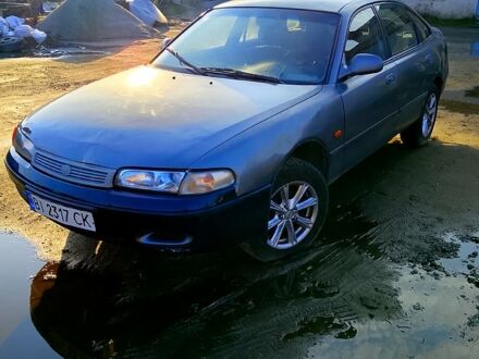 Сірий Мазда 626, об'ємом двигуна 2 л та пробігом 300 тис. км за 1650 $, фото 1 на Automoto.ua