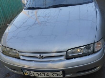 Серый Мазда 626, объемом двигателя 2 л и пробегом 200 тыс. км за 1950 $, фото 1 на Automoto.ua