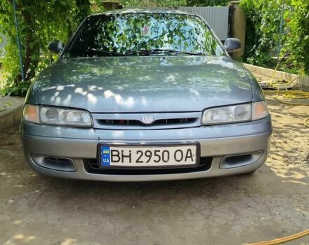 Серый Мазда 626, объемом двигателя 2 л и пробегом 390 тыс. км за 1900 $, фото 1 на Automoto.ua