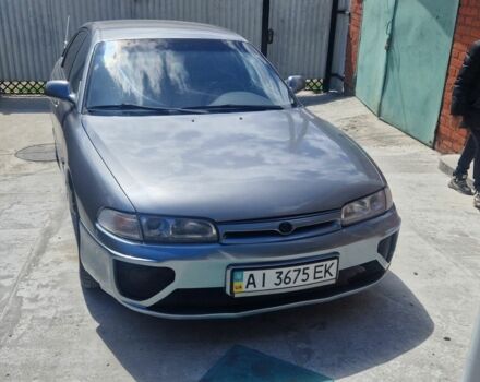 Серый Мазда 626, объемом двигателя 2 л и пробегом 300 тыс. км за 1450 $, фото 1 на Automoto.ua