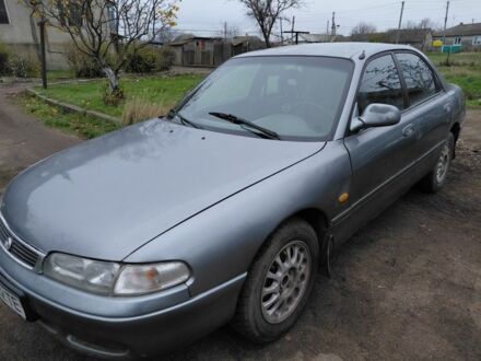 Серый Мазда 626, объемом двигателя 2 л и пробегом 297 тыс. км за 1700 $, фото 1 на Automoto.ua