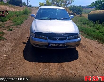 Сірий Мазда 626, об'ємом двигуна 2 л та пробігом 211 тис. км за 1300 $, фото 1 на Automoto.ua