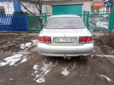 Мазда 626 1994 у Карловке на Automoto.ua Сірий Мазда 626, об'ємом двигуна 1.84 л та пробігом 307 тис. км за 2200 $, фото 1 на Automoto.ua