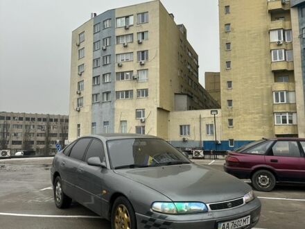 Серый Мазда 626, объемом двигателя 2.5 л и пробегом 235 тыс. км за 1500 $, фото 1 на Automoto.ua