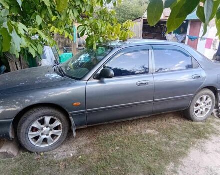 Сірий Мазда 626, об'ємом двигуна 2 л та пробігом 287 тис. км за 1999 $, фото 1 на Automoto.ua