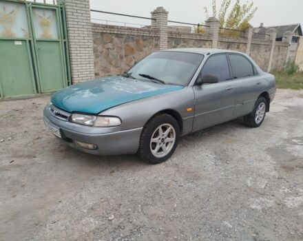 Серый Мазда 626, объемом двигателя 2 л и пробегом 100 тыс. км за 1000 $, фото 1 на Automoto.ua