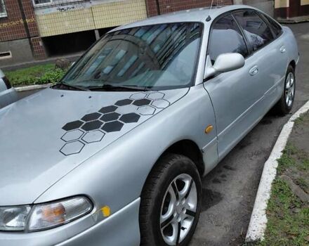 Серый Мазда 626, объемом двигателя 2 л и пробегом 333 тыс. км за 2000 $, фото 1 на Automoto.ua