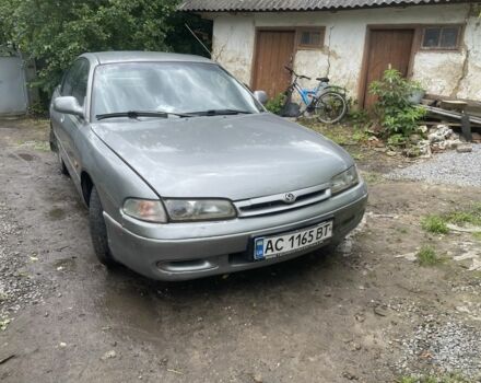 Серый Мазда 626, объемом двигателя 1.8 л и пробегом 320 тыс. км за 800 $, фото 1 на Automoto.ua