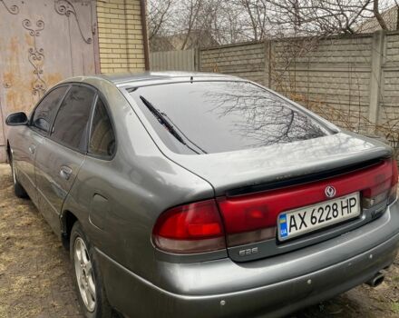 Серый Мазда 626, объемом двигателя 2.5 л и пробегом 300 тыс. км за 700 $, фото 1 на Automoto.ua