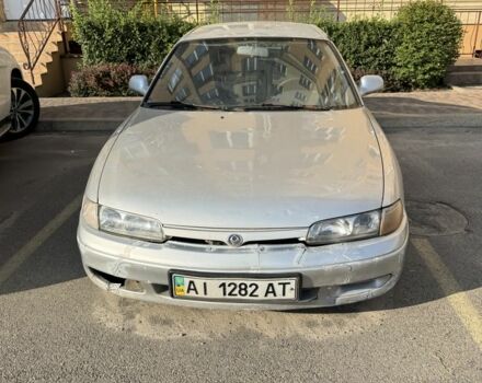 Серый Мазда 626, объемом двигателя 2 л и пробегом 245 тыс. км за 1350 $, фото 1 на Automoto.ua