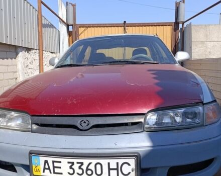 Серый Мазда 626, объемом двигателя 2 л и пробегом 317 тыс. км за 700 $, фото 1 на Automoto.ua