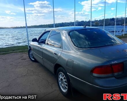 Серый Мазда 626, объемом двигателя 1.8 л и пробегом 0 тыс. км за 2000 $, фото 1 на Automoto.ua