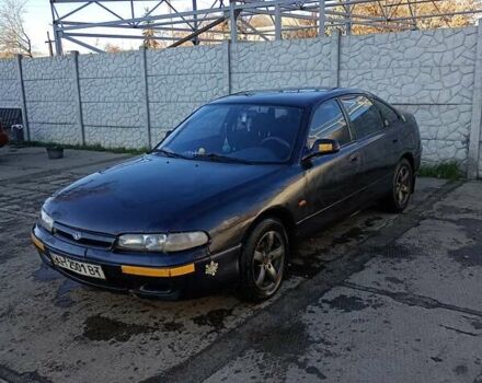 Серый Мазда 626, объемом двигателя 1.8 л и пробегом 444 тыс. км за 1100 $, фото 1 на Automoto.ua