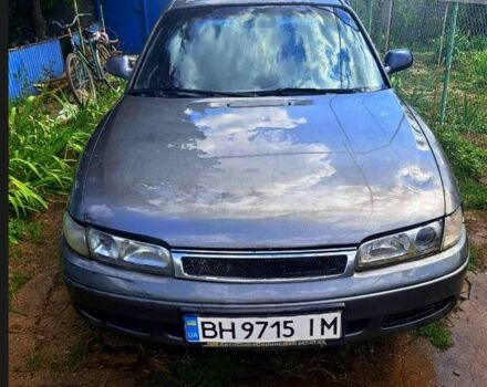 Сірий Мазда 626, об'ємом двигуна 1.8 л та пробігом 385 тис. км за 902 $, фото 1 на Automoto.ua