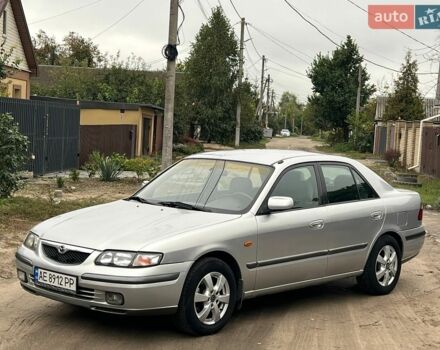 Серый Мазда 626, объемом двигателя 2 л и пробегом 255 тыс. км за 2900 $, фото 1 на Automoto.ua