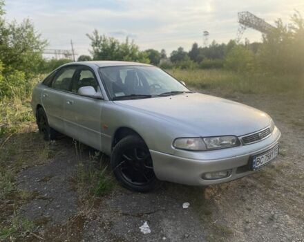Серый Мазда 626, объемом двигателя 2 л и пробегом 350 тыс. км за 1100 $, фото 1 на Automoto.ua