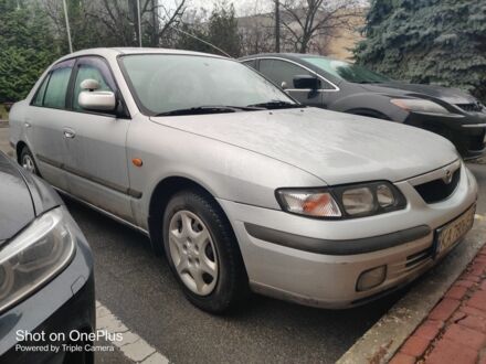 Серый Мазда 626, объемом двигателя 2 л и пробегом 280 тыс. км за 4000 $, фото 1 на Automoto.ua