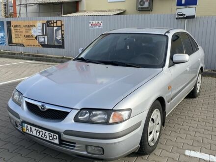 Серый Мазда 626, объемом двигателя 2 л и пробегом 460 тыс. км за 2499 $, фото 1 на Automoto.ua