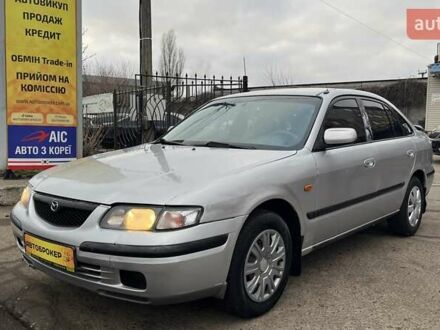Серый Мазда 626, объемом двигателя 2 л и пробегом 321 тыс. км за 1900 $, фото 1 на Automoto.ua