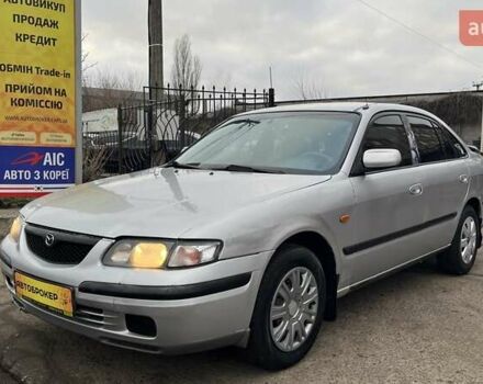 Сірий Мазда 626, об'ємом двигуна 2 л та пробігом 321 тис. км за 1900 $, фото 1 на Automoto.ua