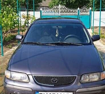 Серый Мазда 626, объемом двигателя 2 л и пробегом 360 тыс. км за 2600 $, фото 1 на Automoto.ua