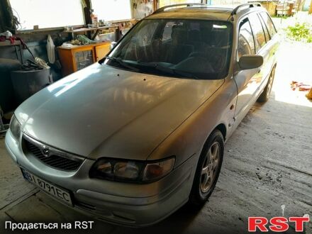 Серый Мазда 626, объемом двигателя 2 л и пробегом 200 тыс. км за 2500 $, фото 1 на Automoto.ua
