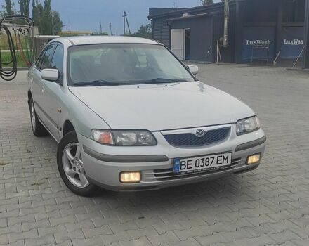 Серый Мазда 626, объемом двигателя 2 л и пробегом 250 тыс. км за 3200 $, фото 1 на Automoto.ua