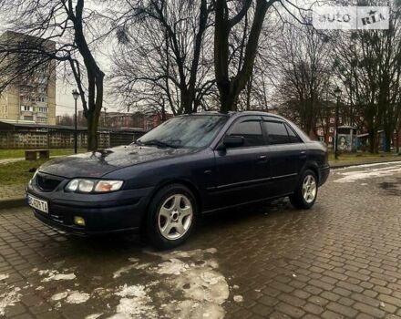 Серый Мазда 626, объемом двигателя 2 л и пробегом 416 тыс. км за 2200 $, фото 1 на Automoto.ua