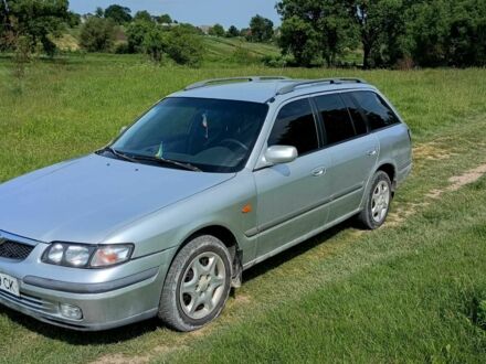 Мазда 626 1998 у Дунаевцах на Automoto.ua Сірий Мазда 626, об'ємом двигуна 2 л та пробігом 270 тис. км за 2700 $, фото 1 на Automoto.ua