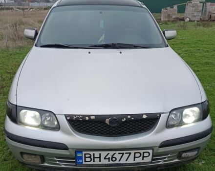 Серый Мазда 626, объемом двигателя 2 л и пробегом 400 тыс. км за 2200 $, фото 1 на Automoto.ua