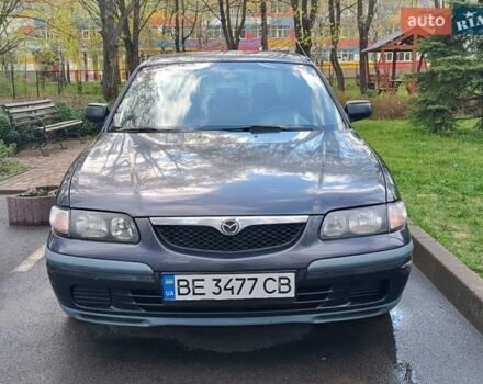 Серый Мазда 626, объемом двигателя 1.9 л и пробегом 318 тыс. км за 2800 $, фото 1 на Automoto.ua