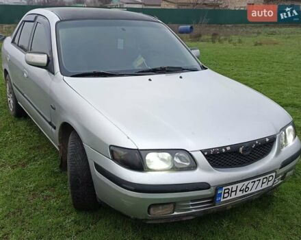 Серый Мазда 626, объемом двигателя 2 л и пробегом 400 тыс. км за 1900 $, фото 1 на Automoto.ua