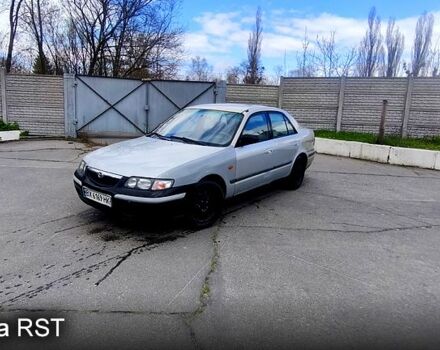 Серый Мазда 626, объемом двигателя 2 л и пробегом 400 тыс. км за 1799 $, фото 1 на Automoto.ua