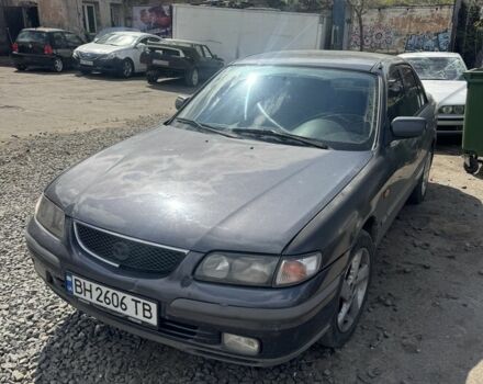 Серый Мазда 626, объемом двигателя 2 л и пробегом 300 тыс. км за 1600 $, фото 1 на Automoto.ua