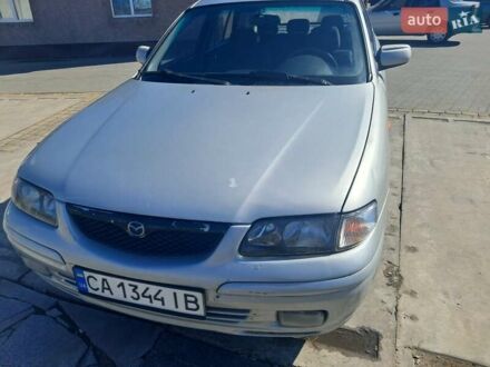 Мазда 626 1998 у Жашкове на Automoto.ua Сірий Мазда 626, об'ємом двигуна 2 л та пробігом 406 тис. км за 2300 $, фото 1 на Automoto.ua