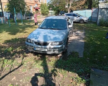 Серый Мазда 626, объемом двигателя 2 л и пробегом 301 тыс. км за 1605 $, фото 1 на Automoto.ua