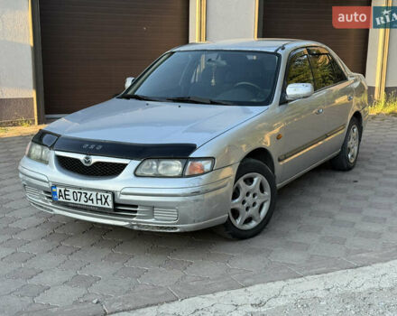Серый Мазда 626, объемом двигателя 2 л и пробегом 333 тыс. км за 1375 $, фото 1 на Automoto.ua