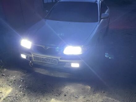 Мазда 626 1998 в Белгород-Днестровском на Automoto.ua Серый Мазда 626, объемом двигателя 2 л и пробегом 425 тыс. км за 4500 $, фото 1 на Automoto.ua