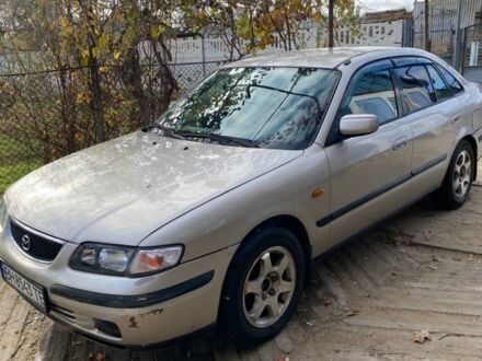 Сірий Мазда 626, об'ємом двигуна 2 л та пробігом 312 тис. км за 3399 $, фото 1 на Automoto.ua